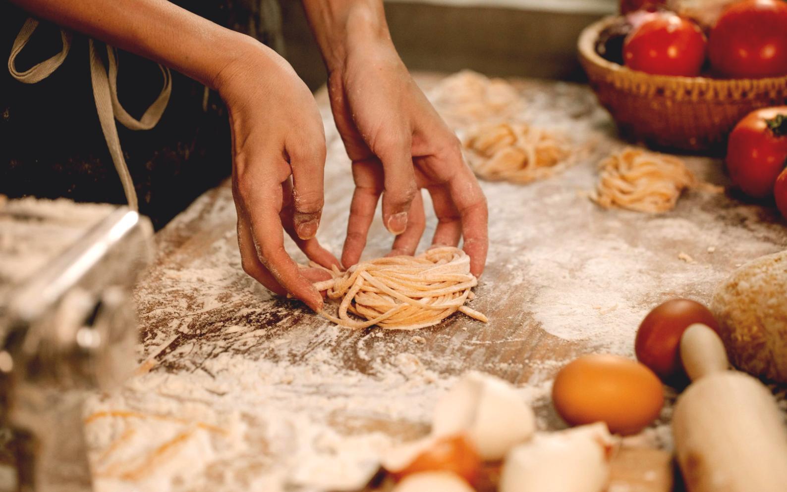 Student practicing advanced plating techniques with instructor guidance